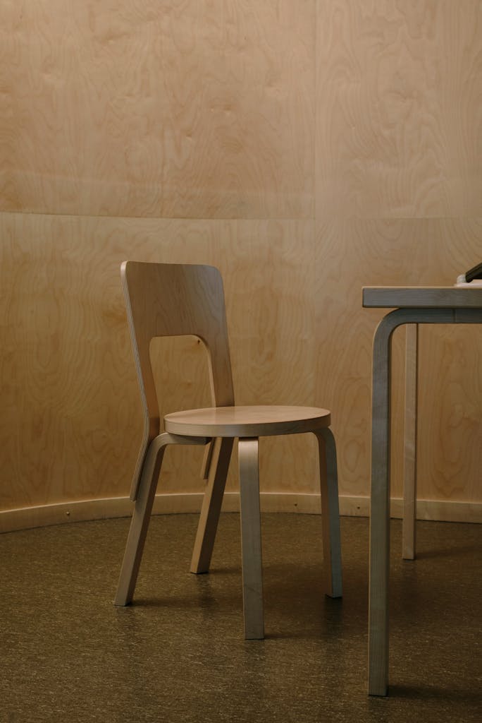 Wooden table and chair in room